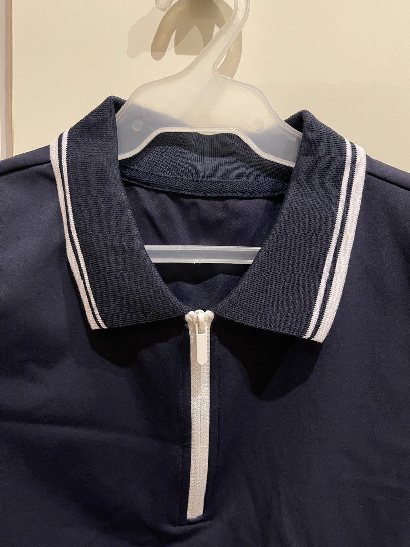 Quarter-Zip Polo Shirt Activewear (Category: Activewear) located in Quezon City. Submitted by everythingmustgo__ (Listing ID 1470235408, Image 3). Description: Brand new with tags Size: medium Best fit: s-semi m frames Color: navy blue Best for pickleball/tennis Seller’s actual size is extra small-small (when worn for reference only) ‼️ firm with price. low ballers will not be entertained ‼️.