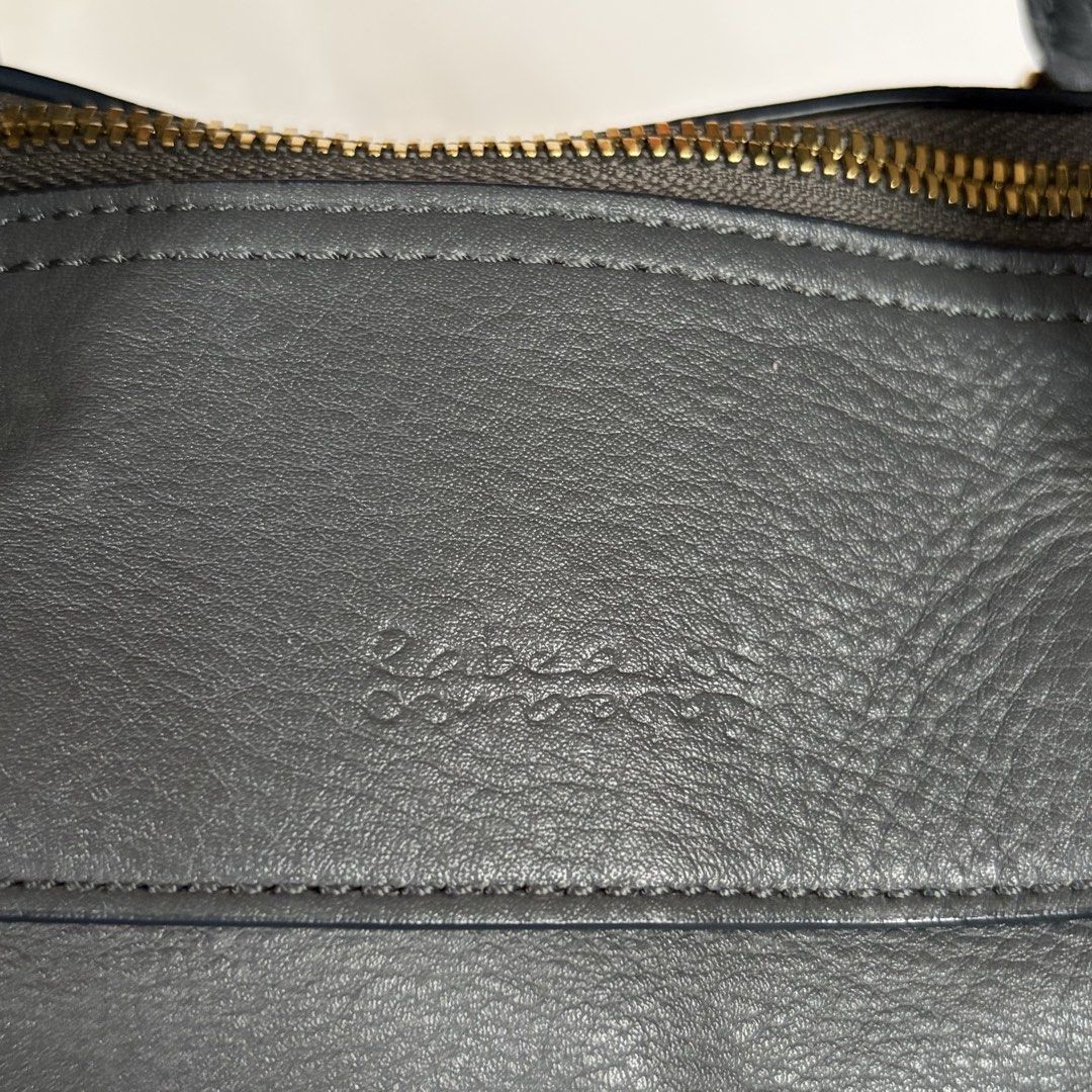 Rabeanco 2 way bag (Category: Luxury Bags & Wallets) located in Roxas City. Submitted by rglnos (Listing ID 1470225620, Image 3). Description: NO FLAWS! GOOD AS NEW! Gray color Well-preserved & crisp! Plastic intact on every zipper puller 🔒 swipe left to see close-up details!.