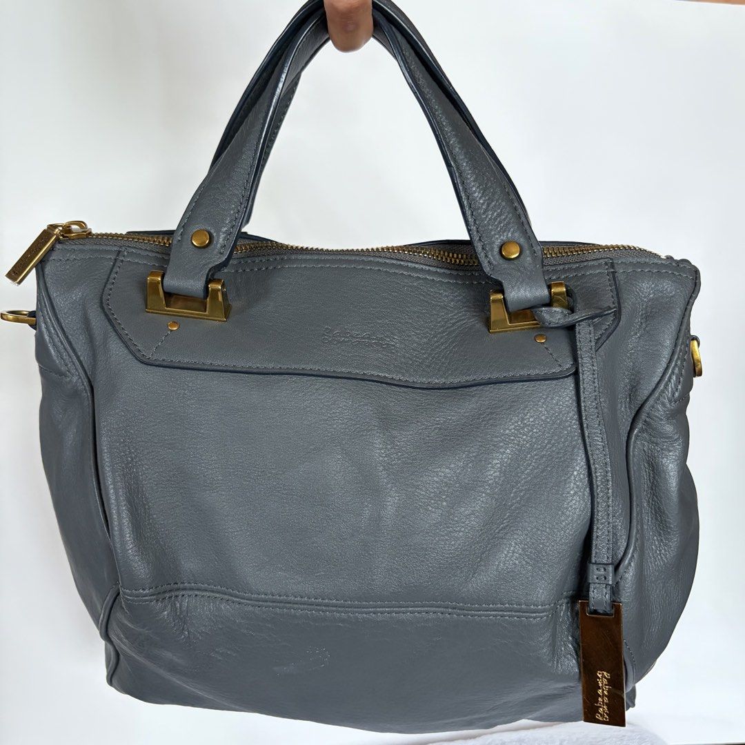 Rabeanco 2 way bag (Category: Luxury Bags & Wallets) located in Roxas City. Submitted by rglnos (Listing ID 1470225620, Image 1). Description: NO FLAWS! GOOD AS NEW! Gray color Well-preserved & crisp! Plastic intact on every zipper puller 🔒 swipe left to see close-up details!.