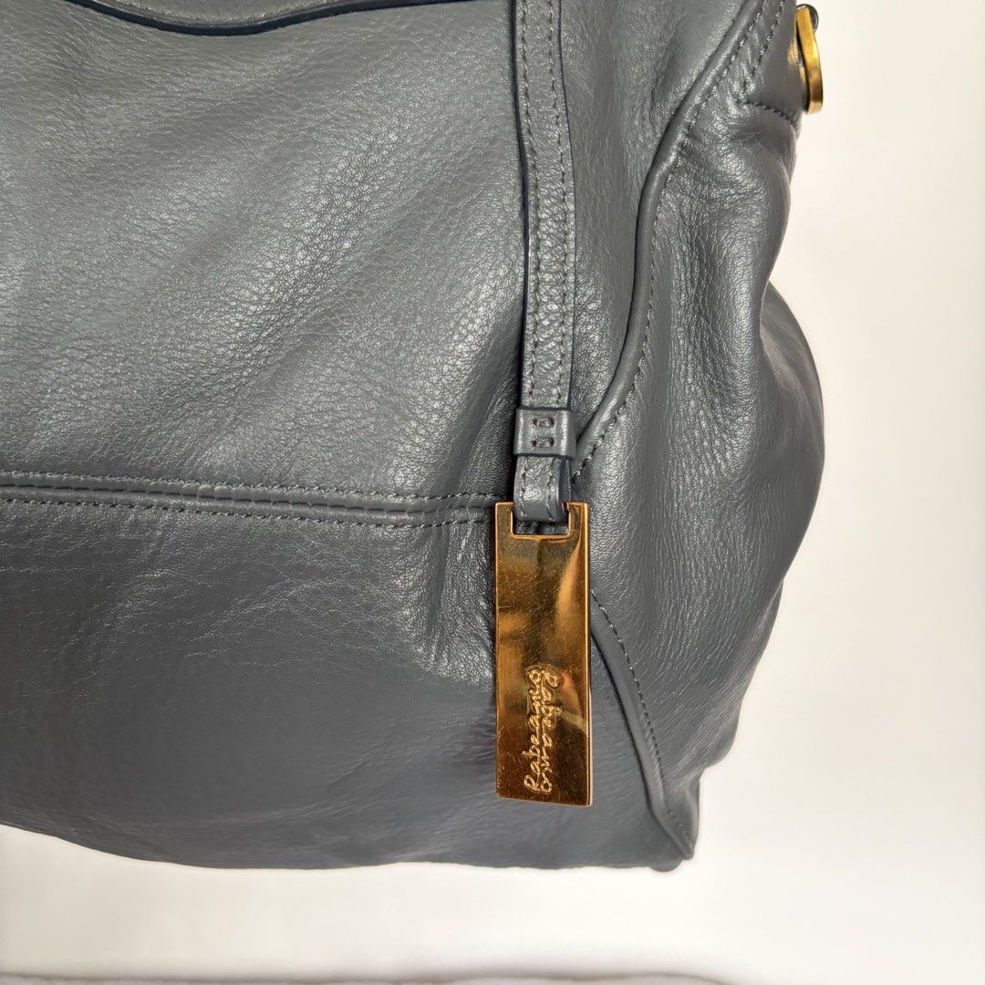 Rabeanco 2 way bag (Category: Luxury Bags & Wallets) located in Roxas City. Submitted by rglnos (Listing ID 1470225620, Image 2). Description: NO FLAWS! GOOD AS NEW! Gray color Well-preserved & crisp! Plastic intact on every zipper puller 🔒 swipe left to see close-up details!.