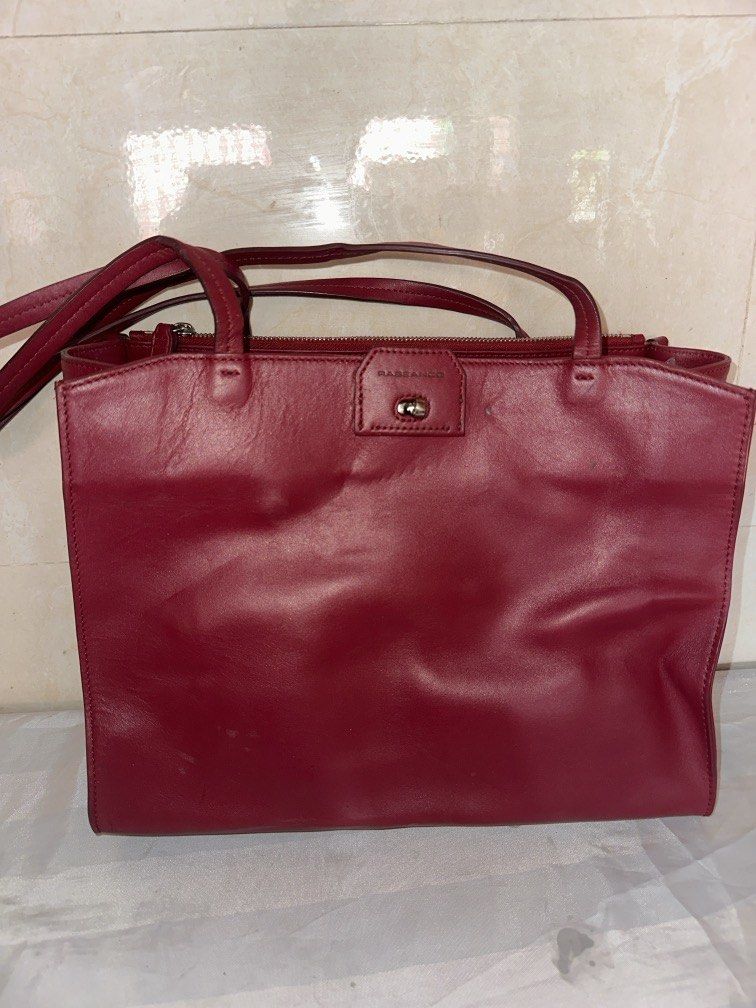 Rabeanco Office Shoulder Tote Bag (Category: Shoulder Bags) located in Caloocan City. Submitted by hariel_beverly_onlineshop (Listing ID 1470222294, Image 2). Description: This item is an authentic Rabeanco Red Leather Office Shoulder Bag, known for its classic, multi-compartment rectangular architecture that serves as a highly functional everyday or work tote. It is crafted from premium smooth cowhide leather and features comfortable dual should