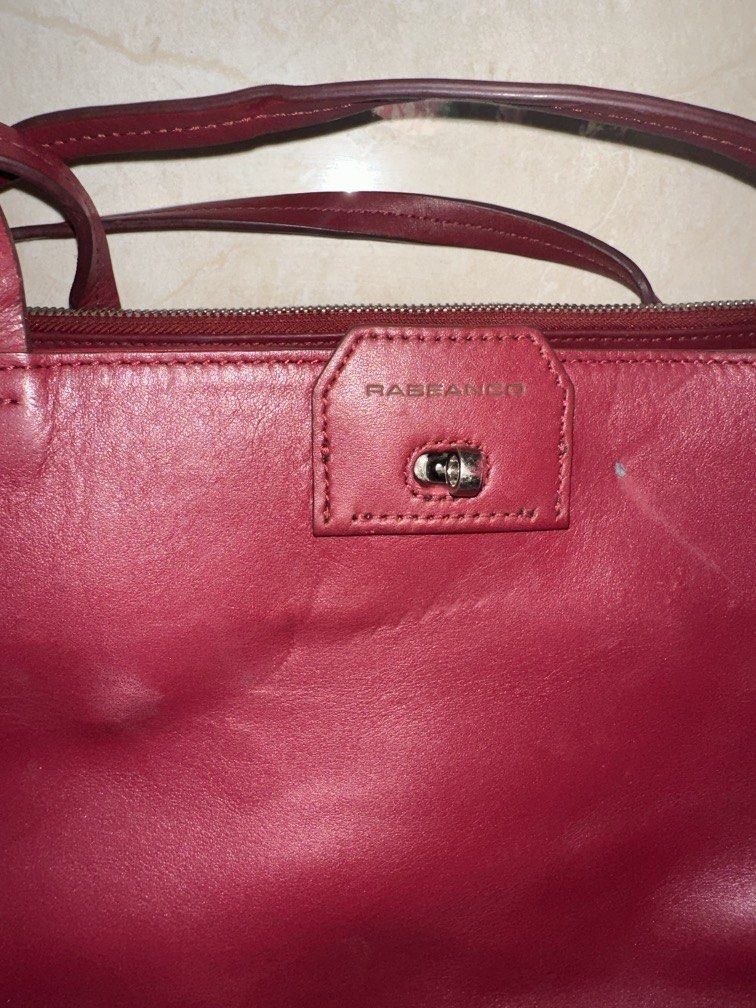 Rabeanco Office Shoulder Tote Bag (Category: Shoulder Bags) located in Caloocan City. Submitted by hariel_beverly_onlineshop (Listing ID 1470222294, Image 3). Description: This item is an authentic Rabeanco Red Leather Office Shoulder Bag, known for its classic, multi-compartment rectangular architecture that serves as a highly functional everyday or work tote. It is crafted from premium smooth cowhide leather and features comfortable dual should