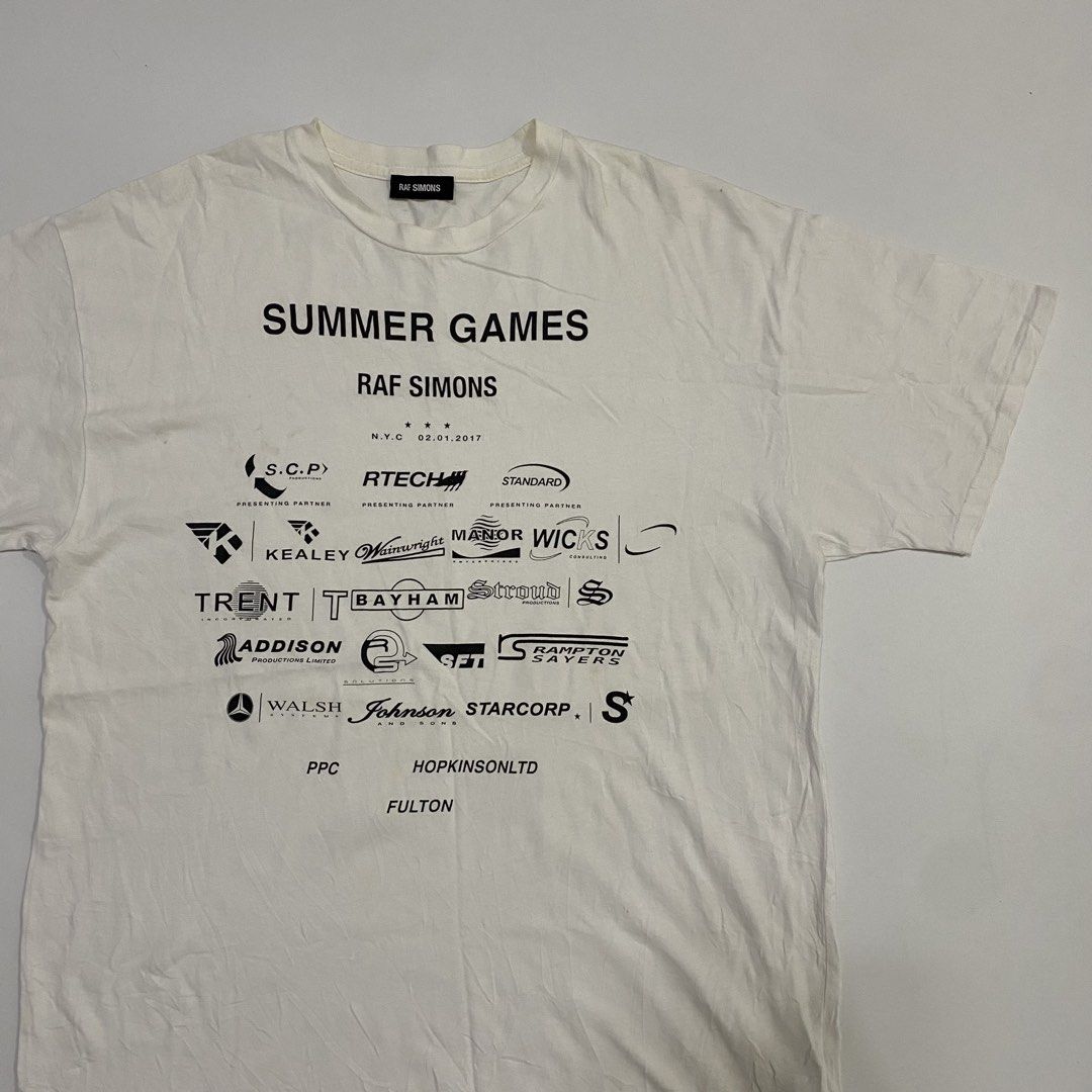 Raf Simons - F/W’17-18 Summer Games Tee (Category: Tshirts & Polo Shirts ) located in Cavite. Submitted by pastseas0n_ (Listing ID 1470185376, Image 2). Description: Raf Simons - Summer Games Tee Size : SMALL (fit to L) FLAT MEASUREMENTS Width : 21 inches Length : 30 inches Shoulder : 21 inches Sleeve : 7 inches 9/10 CONDITION Authentic Worn by DRAKE Made in Italy.