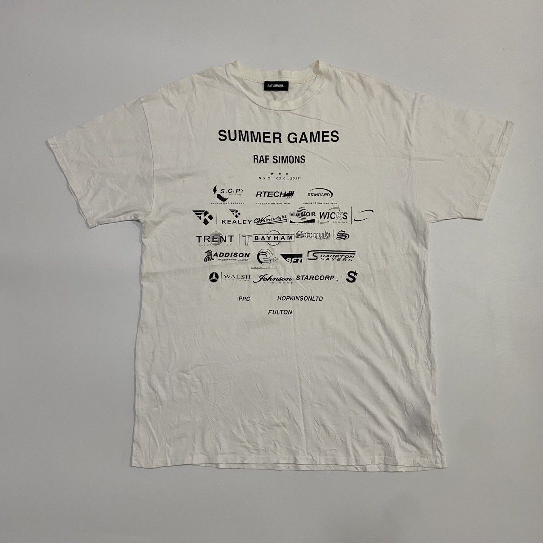 Raf Simons - F/W’17-18 Summer Games Tee (Category: Tshirts & Polo Shirts ) located in Cavite. Submitted by pastseas0n_ (Listing ID 1470185376, Image 1). Description: Raf Simons - Summer Games Tee Size : SMALL (fit to L) FLAT MEASUREMENTS Width : 21 inches Length : 30 inches Shoulder : 21 inches Sleeve : 7 inches 9/10 CONDITION Authentic Worn by DRAKE Made in Italy.
