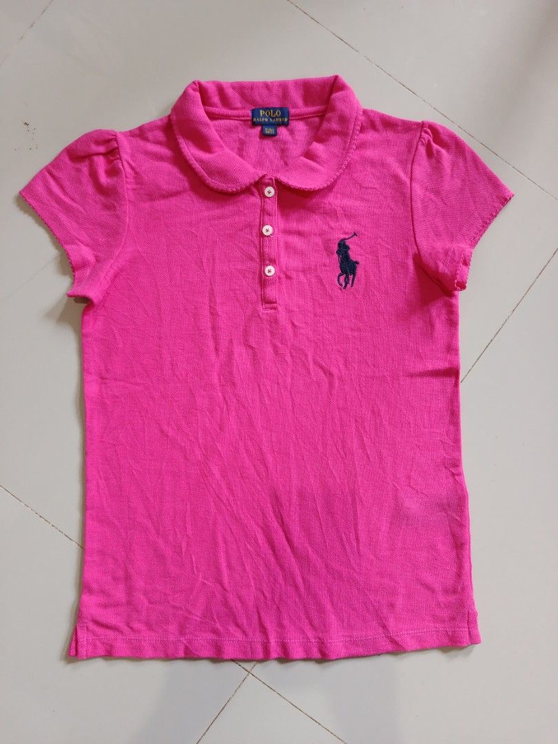 Ralph Lauren polo shirt (Category: Babies & Kids Fashion) located in Davao. Submitted by 07dward (Listing ID 1470162215, Image 1). Description: This pink Polo Ralph Lauren children's short-sleeve polo shirt features a Peter Pan collar with delicate ruffled trim.