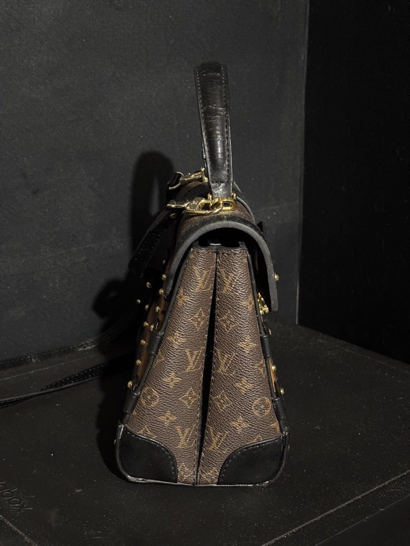 RARE LOUIS VUITTON TRIANON PM (Category: Luxury Bags & Wallets) located in Quezon City. Submitted by qr8d.ph (Listing ID 1470211279, Image 3). Description: ❗️PLEASE READ❗️ Item is a rare Louis Vuitton Trianon PM bag in classic monogram coated leather with black leather lining and gold hardware, it comes with a wooden accent on both front and back of the bag that gives it the classic trunk vibes where LV is very known for. Item comes with an adjus