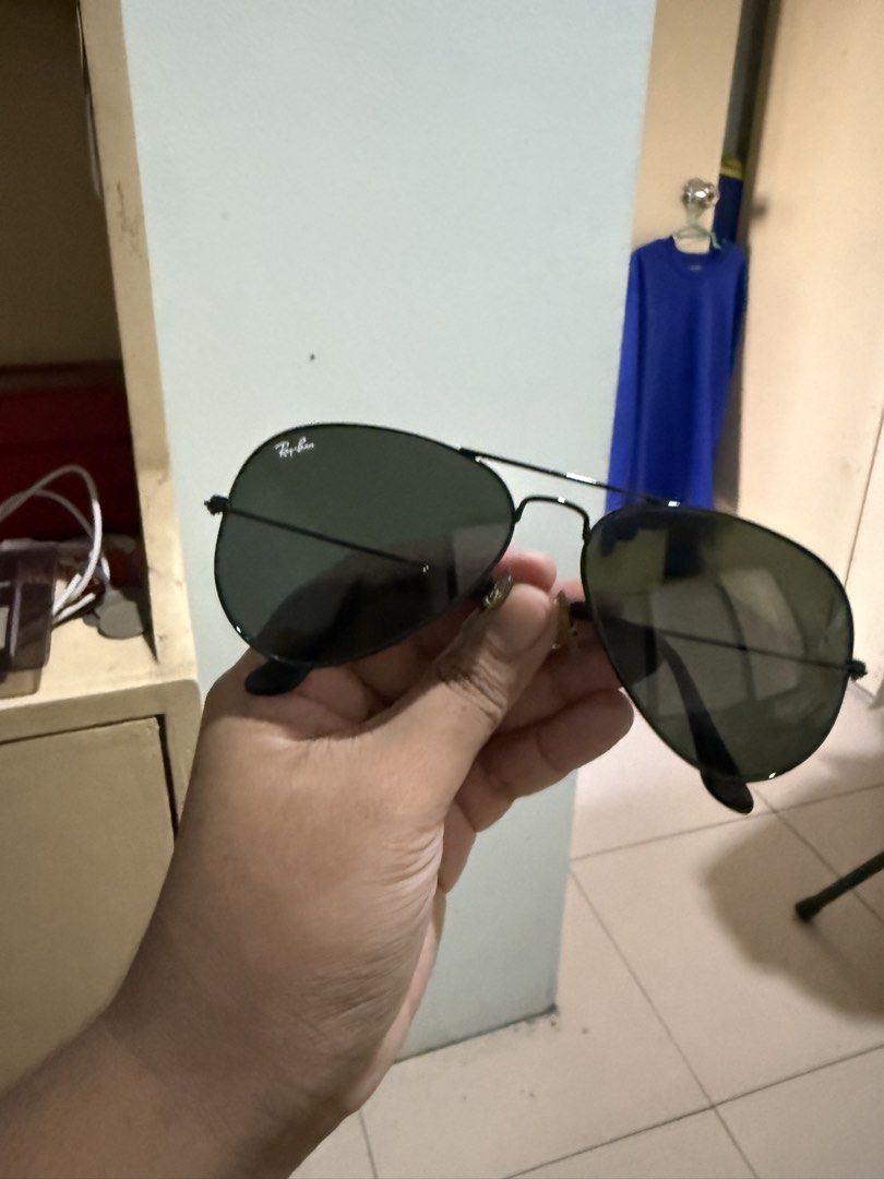 Ray-Ban Aviator Sunglasses with Case and Cloth (Category: Sunglasses & Eyewear) located in Bacoor. Submitted by enigmaann (Listing ID 1470210392, Image 3). Description: - Brand: Ray-Ban Aviator - Frame Color: Classic black - Lenses: Dark - Condition: Minimal wear, excellent and ready to wear - Inclusions: Original leather case and cleaning cloth - Style: Timeless and versatile.