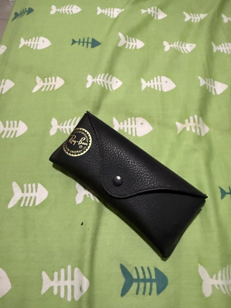 Ray-Ban Aviator Sunglasses with Case and Cloth (Category: Sunglasses & Eyewear) located in Bacoor. Submitted by enigmaann (Listing ID 1470210392, Image 1). Description: - Brand: Ray-Ban Aviator - Frame Color: Classic black - Lenses: Dark - Condition: Minimal wear, excellent and ready to wear - Inclusions: Original leather case and cleaning cloth - Style: Timeless and versatile.