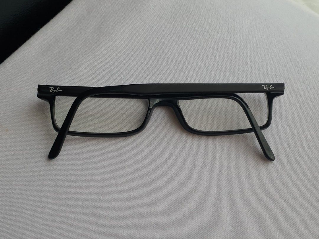 Ray-Ban Slim Eyeglass Frame (Category: Sunglasses & Eyewear) located in Quezon City. Submitted by WasalakTwo (Listing ID 1470238783, Image 2). Description: Bought in Japan Authentic Goodcondition Clean and presentable Lens are graded, but replaceable Open for delivery nationwide Front Width 12.5cm Front Height 2.7cm.