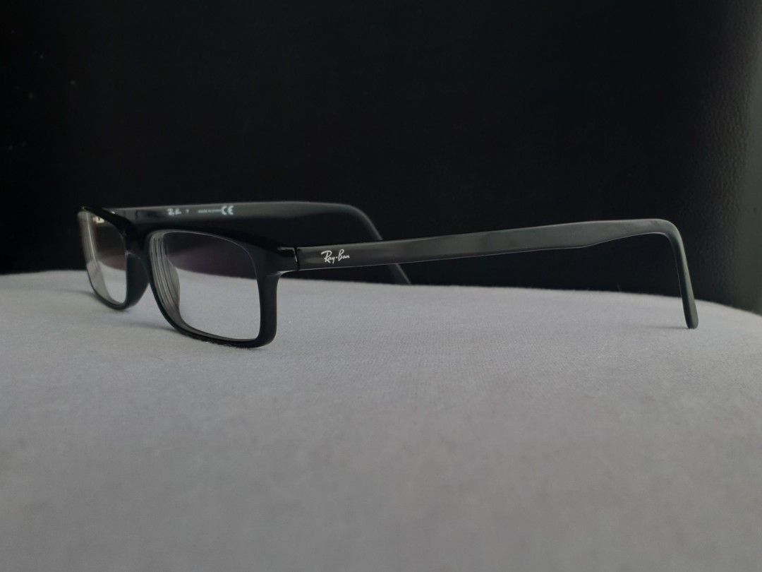 Ray-Ban Slim Eyeglass Frame (Category: Sunglasses & Eyewear) located in Quezon City. Submitted by WasalakTwo (Listing ID 1470238783, Image 3). Description: Bought in Japan Authentic Goodcondition Clean and presentable Lens are graded, but replaceable Open for delivery nationwide Front Width 12.5cm Front Height 2.7cm.