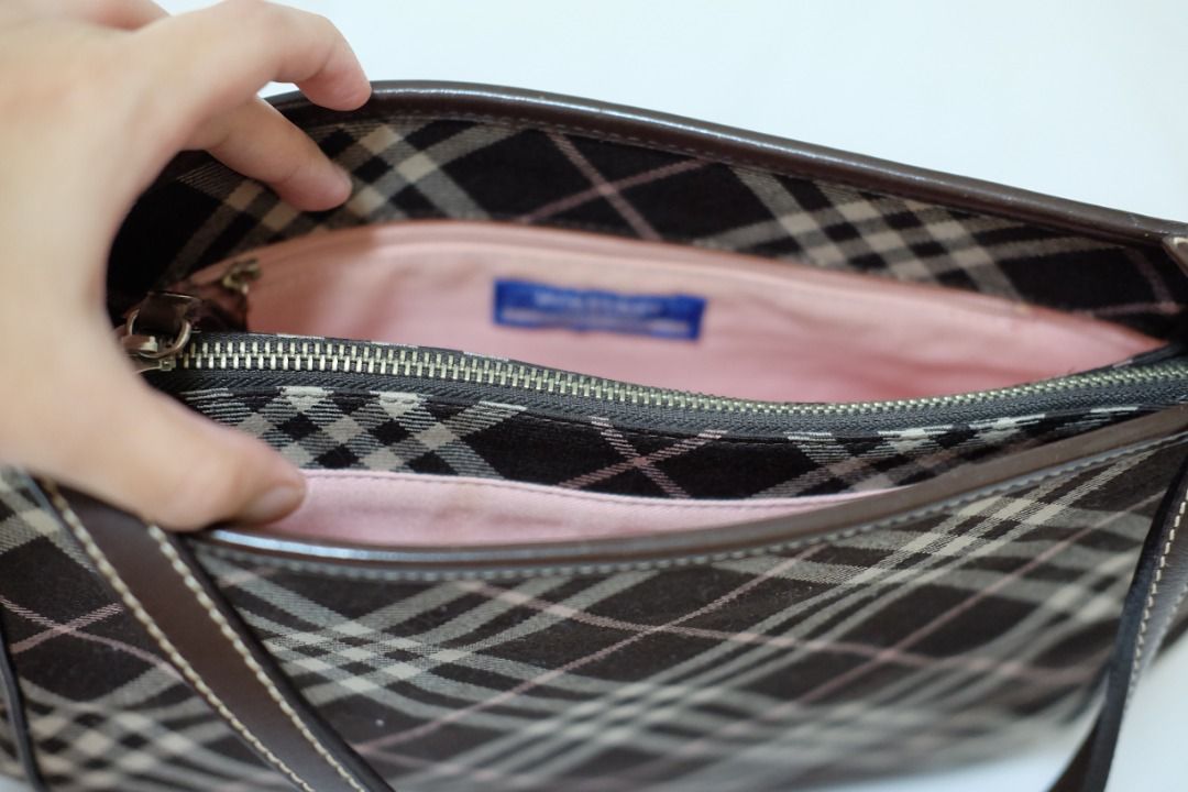 Red and white toy airplane with wheels (Category: Luxury Bags & Wallets) located in Cavite. Submitted by yrdce (Listing ID 1470167251, Image 3). Description: Blue label Burberry shoulder bag Spacious, can fit ipad No inclusions, bag only.