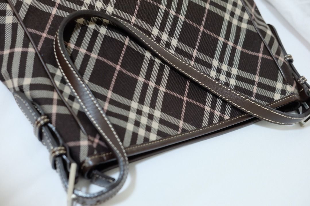 Red and white toy airplane with wheels (Category: Luxury Bags & Wallets) located in Cavite. Submitted by yrdce (Listing ID 1470167251, Image 2). Description: Blue label Burberry shoulder bag Spacious, can fit ipad No inclusions, bag only.
