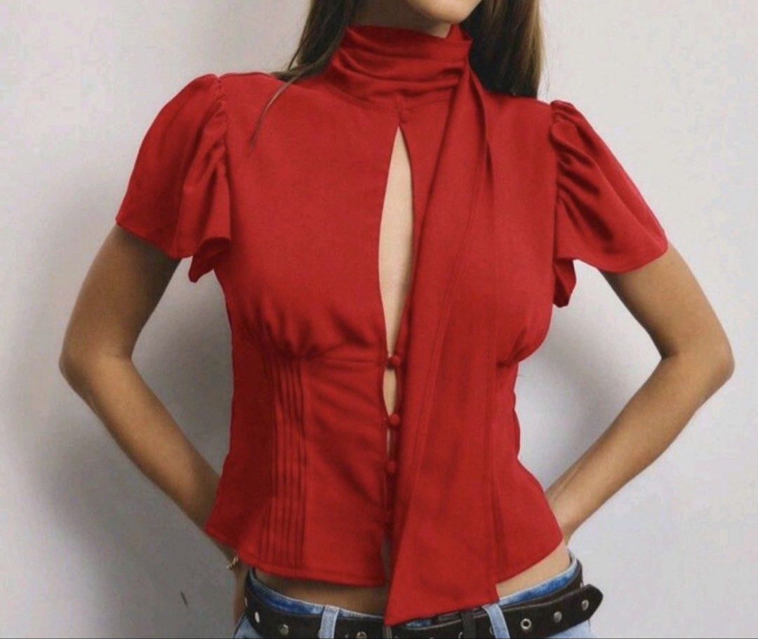 Red High Neck Puff Sleeve Button Front Blouse (Category: Blouses) located in Quezon City. Submitted by japfoodl0ver (Listing ID 1470177378, Image 1). Description: - fits xs to s - bought here in carousell, pics are from og seller - in good condition.