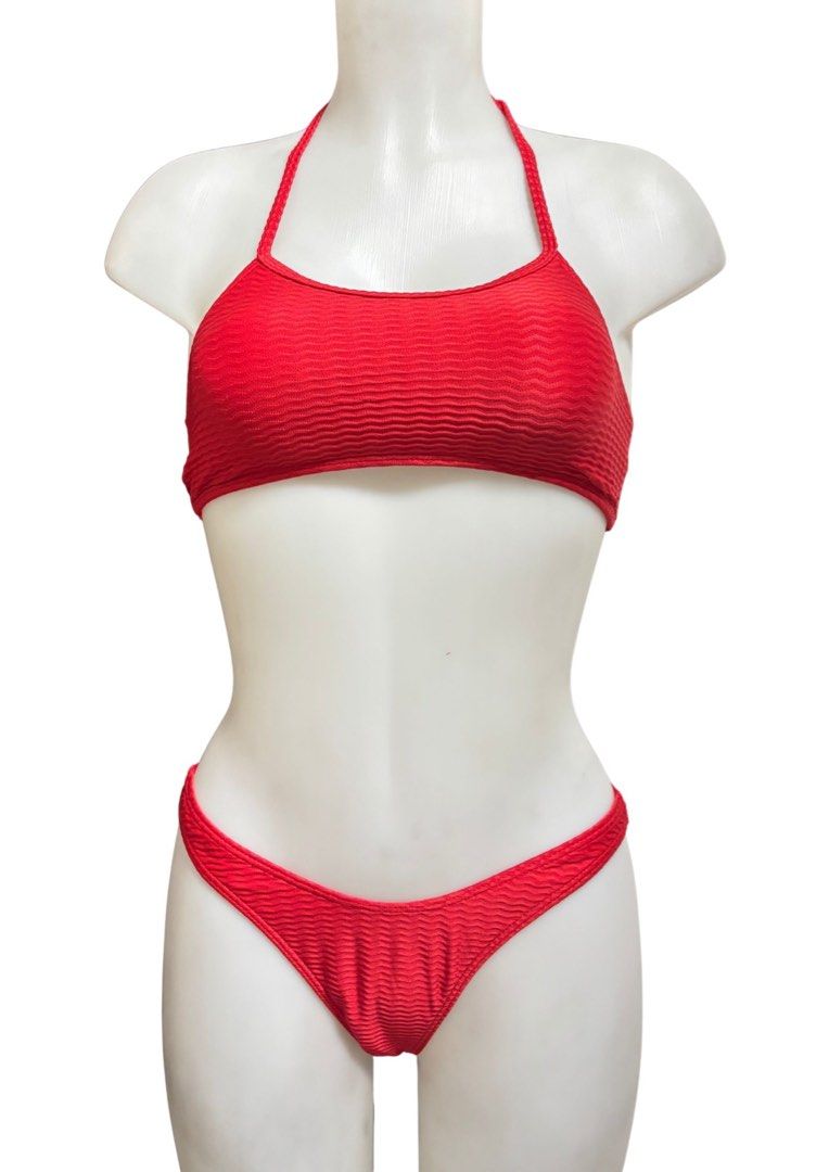 Red textured two-piece halter bikini swimwear (Category: Bikinis & Swimsuits) located in Caloocan City. Submitted by shibowhii (Listing ID 1470233933, Image 1). Description: .
