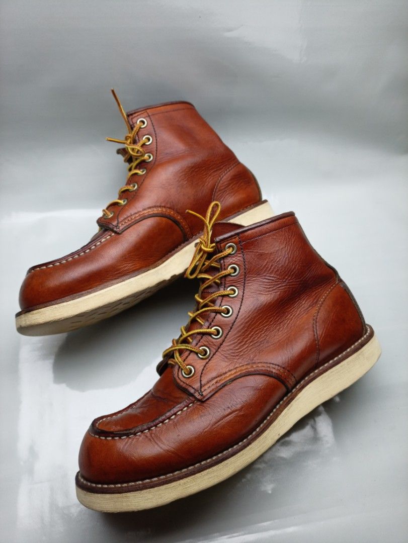 Red Wing 875 Moc Toe Boots 7 US D / 6 UK (Category: Boots) located in Dasmarinas. Submitted by ziapatos (Listing ID 1470278705, Image 3). Description: Red Wing 875 moc toe boots in brown leather. Iconic heritage style with contrast welt stitching and white cushion crepe soles. Size 7 US D men's, 6 UK, 39 EUR, 25 cm insole. Rugged build with classic yellow and brown taslan laces. Minimal creasing on the uppers, soles show very clean edges. Premium
