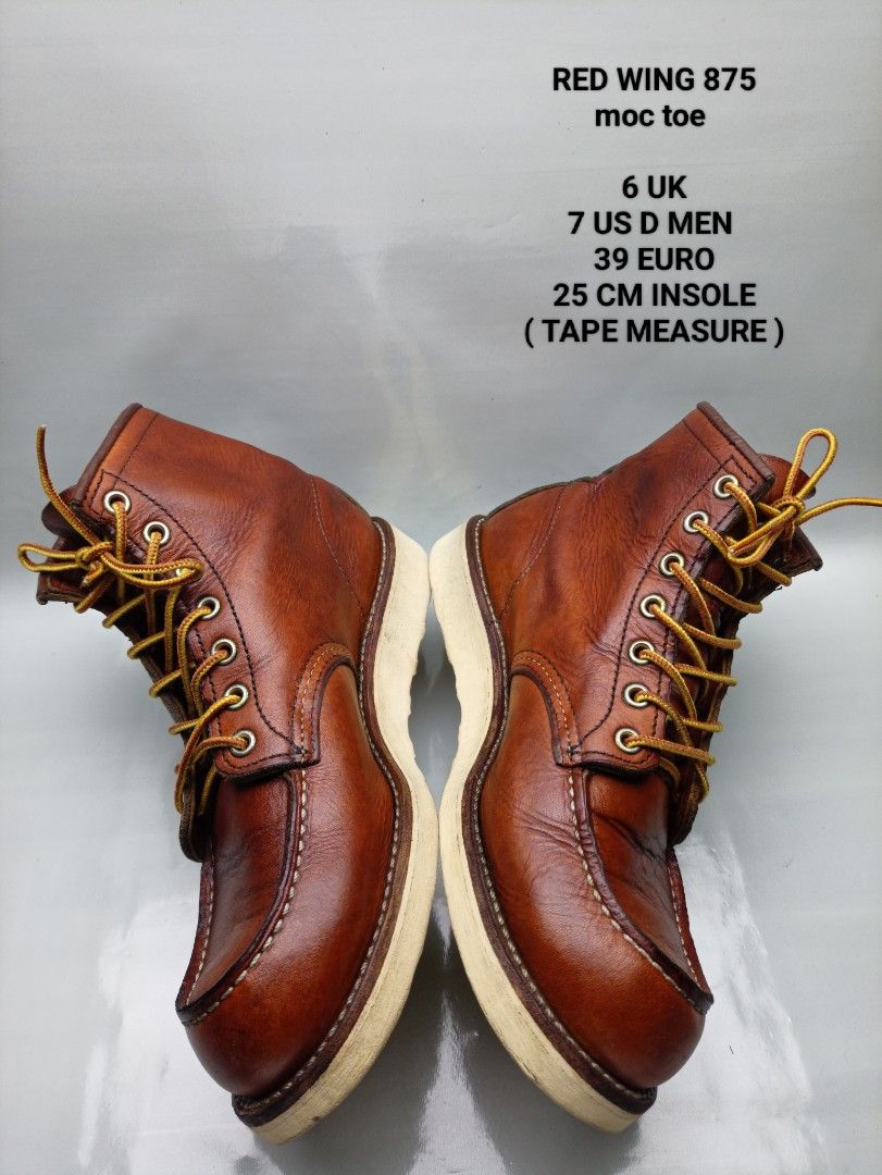 Red Wing 875 Moc Toe Boots 7 US D / 6 UK (Category: Boots) located in Dasmarinas. Submitted by ziapatos (Listing ID 1470278705, Image 1). Description: Red Wing 875 moc toe boots in brown leather. Iconic heritage style with contrast welt stitching and white cushion crepe soles. Size 7 US D men's, 6 UK, 39 EUR, 25 cm insole. Rugged build with classic yellow and brown taslan laces. Minimal creasing on the uppers, soles show very clean edges. Premium