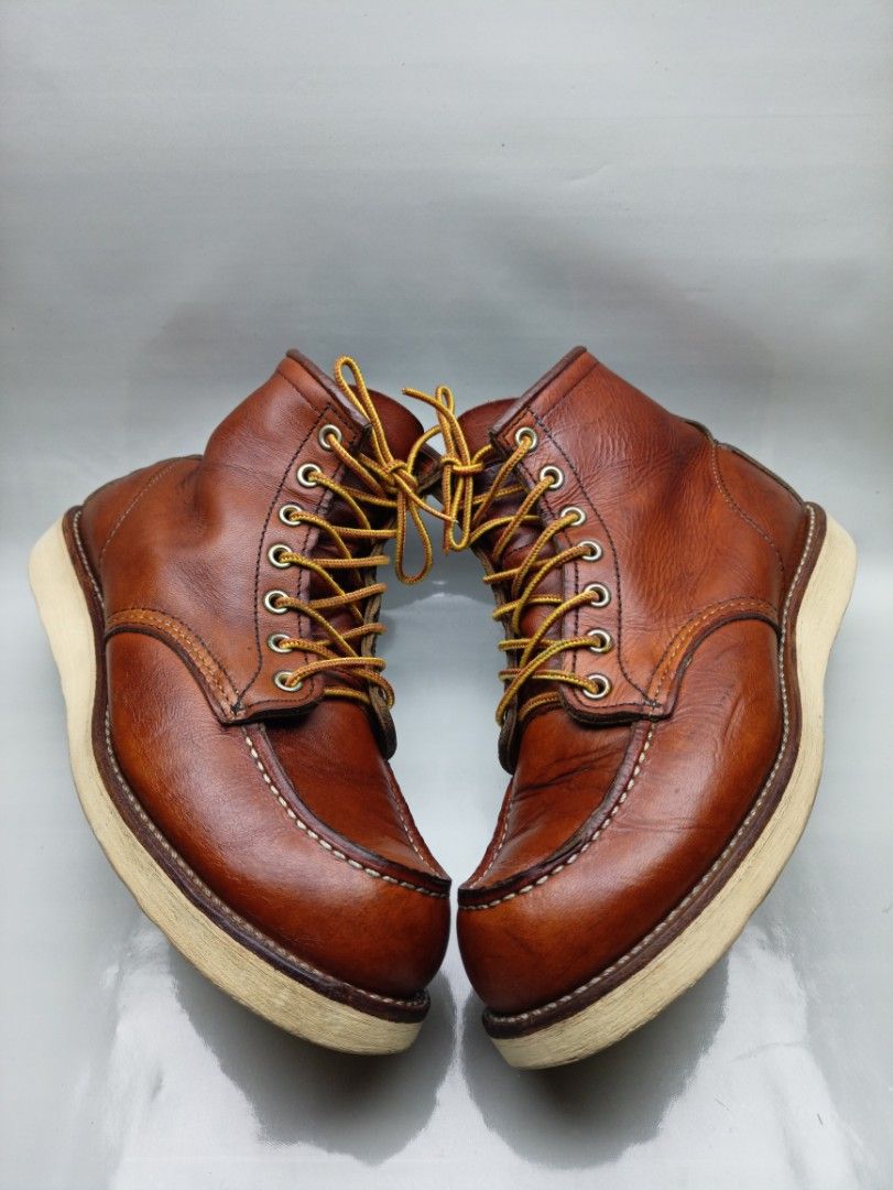 Red Wing 875 Moc Toe Boots 7 US D / 6 UK (Category: Boots) located in Dasmarinas. Submitted by ziapatos (Listing ID 1470278705, Image 2). Description: Red Wing 875 moc toe boots in brown leather. Iconic heritage style with contrast welt stitching and white cushion crepe soles. Size 7 US D men's, 6 UK, 39 EUR, 25 cm insole. Rugged build with classic yellow and brown taslan laces. Minimal creasing on the uppers, soles show very clean edges. Premium