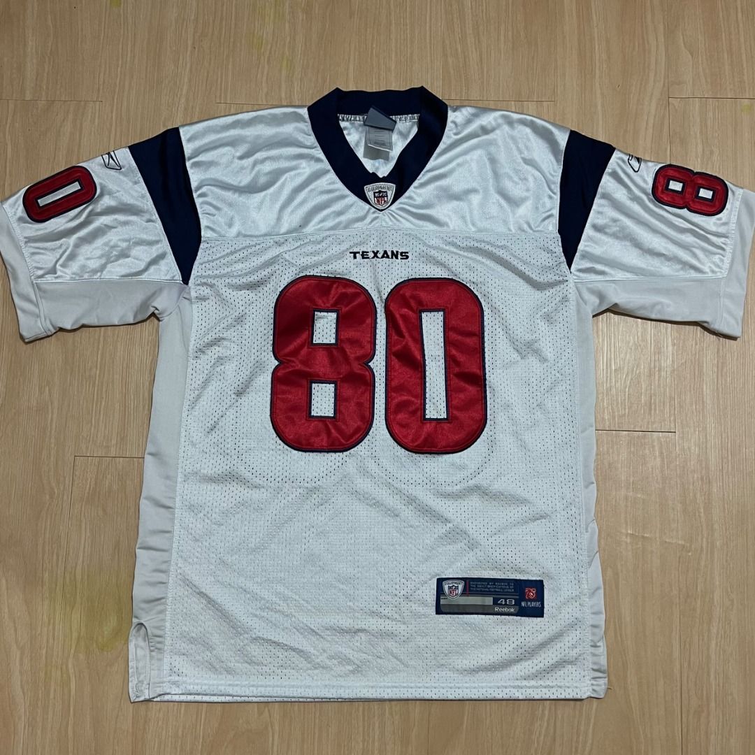 Reebok NFL Houston Texans Andre Johnson 80 Jersey White (Category: Activewear) located in Manila. Submitted by luxurybagsandshoes (Listing ID 1470233246, Image 1). Description: - Authentic Reebok Houston Texans Andre Johnson #80 jersey - Color: White body with navy blue collar and shoulder panels - Details: Red and blue tackle twill numbers and player name on back - Badges: NFL Equipment patch at the V-neck and Reebok logo patches on sleeves - Co