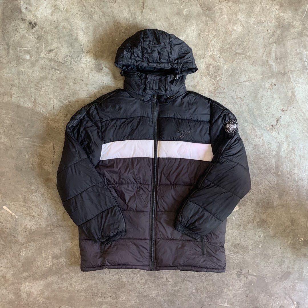 Reebok Puffer Jacket Black White XL (Category: Coats, Jackets and Outerwear) located in Manila. Submitted by emplysthrift. (Listing ID 1470271832, Image 1). Description: Reebok Puffer Jacket XL Black White Stripe Hooded Width "26 Length "31 Good Condition Colorrate: 9.3/10 Flaws: minor sign of usage / nahawaan ng ibang kulay nung nilabhan ko pero wasable naman po kayo nalang po ulit mag laba at di naman po iindahin hehe Unli vouch/vc for safe tra