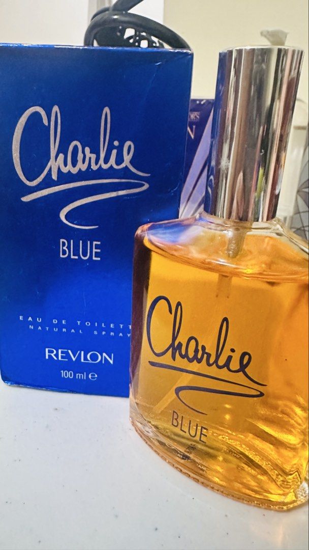 Revlon Charlie Blue EDT 100ml (Category: Fragrance & Deodorants) located in Candelaria. Submitted by zillerortsac (Listing ID 1470210633, Image 2). Description: Original (USA source) - Brand: Revlon Charlie Blue - Type: Eau de Toilette (EDT) Natural Spray - Size: 100ml - Fragrance: Fresh floral notes, perfect for everyday wear - Packaging: Brand new, unopened in iconic classic blue box - Dispenser: Standard spray nozzle top - Condition: 100% auth