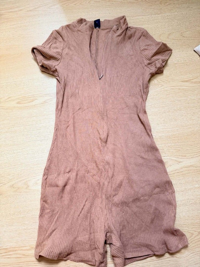 Ribbed Short Sleeve Romper Dusty Pink (Category: Rompers) located in Manila. Submitted by coolcrystal_59d22e (Listing ID 1470168743, Image 1). Description: - Color: Dusty pink - Style: Ribbed romper with short sleeves and front zipper - Fit: Fitted through the body and shorts, Size M - Material: Stretchy and super comfortable fabric - Perfect for lounging at home or casual days out.