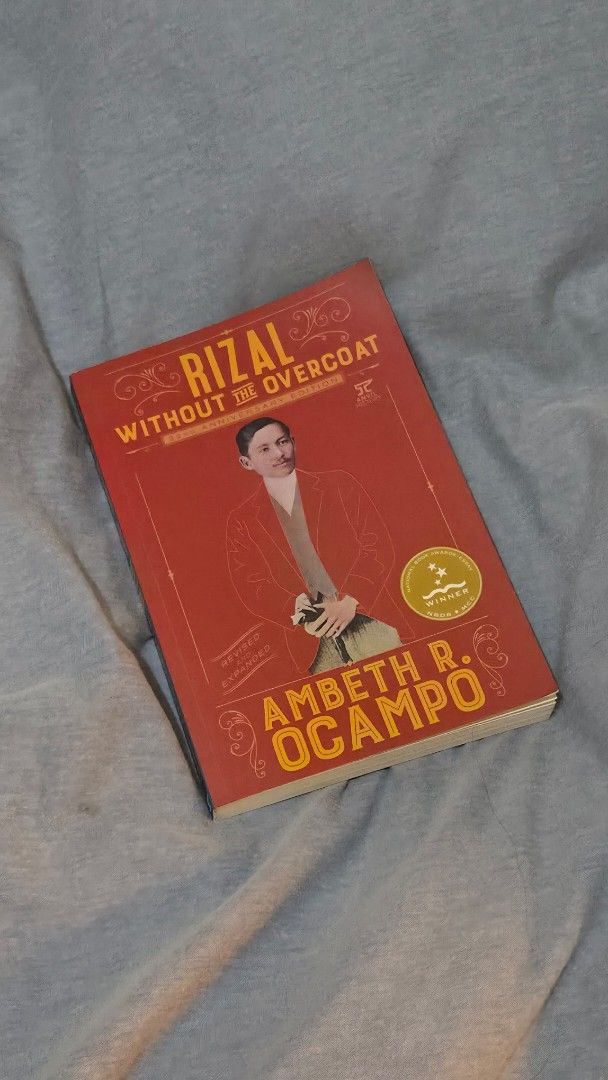 Rizal Without the Overcoat by Ambeth R. Ocampo (Category: Storybooks) located in Muntinlupa City. Submitted by pearlbookstore (Listing ID 1470303150, Image 1). Description: - Title: Rizal Without the Overcoat (Revised Expanded Edition) - Author: Ambeth R. Ocampo (Signed and inscribed on the inside title page) - Publisher: Anvil Publishing - Format: Softcover with red cover - Condition: Clean pages with minor shelf wear on the edges - Ideal for: H