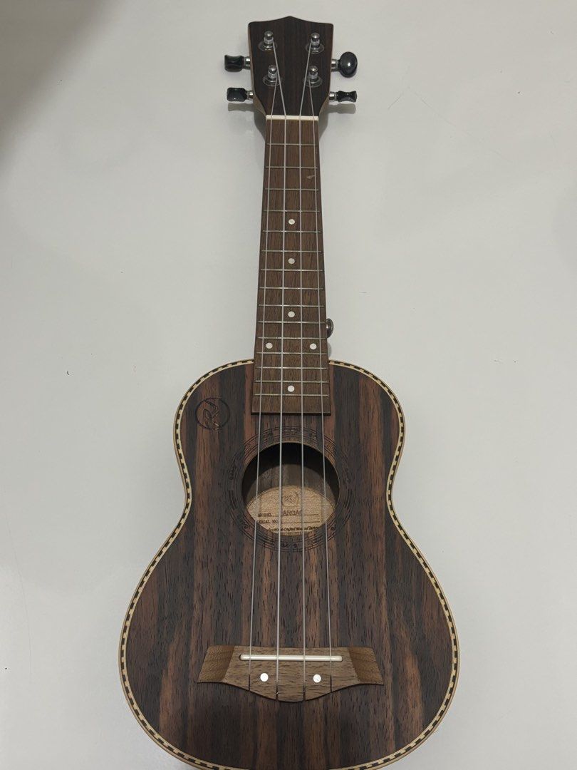 RJ Ukulele (Model Argao) (Category: Musical Instruments) located in Quezon City. Submitted by kmalvrz (Listing ID 1470301150, Image 1). Description: bought 2-ish years ago. rarely used. may konting gasgas (?) sa may fretboard. comes with a random old case for another ukulele. selling within metro manila, lalamove only. sf shouldered by the buyer..