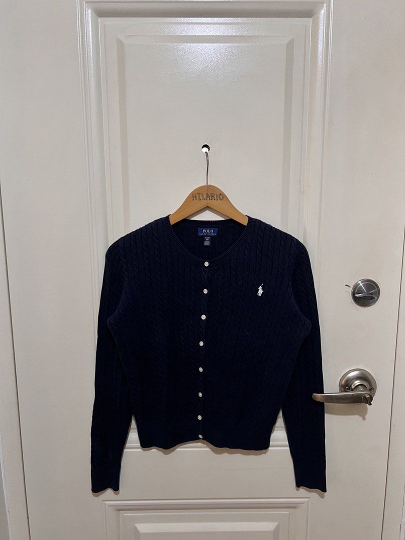 RL Cable Knitted Cardigan Navy Blue (Category: Coats, Jackets and Outerwear) located in San Pedro. Submitted by _eyamarieii (Listing ID 1470334693, Image 1). Description: RL Cable Knitted Cardigan Lightly used condition Color rate 9/10 No issue Size L (16) ontag Fitting size Small women's Width 19.5 Length 20.5 • 1,250+sf.