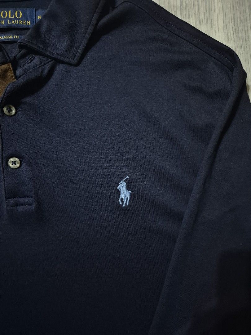 RL Quater bottoms long sleeve (Category: Tshirts & Polo Shirts ) located in Taguig. Submitted by kai.exe (Listing ID 1470306699, Image 2). Description: RL Quarter Bottoms long sleeve Navy blue size Medium on tag 🏷️ Dimes W 22-23 stretch L 28 Excellent condition Color rate 9.5 or better no issue Open for nego.