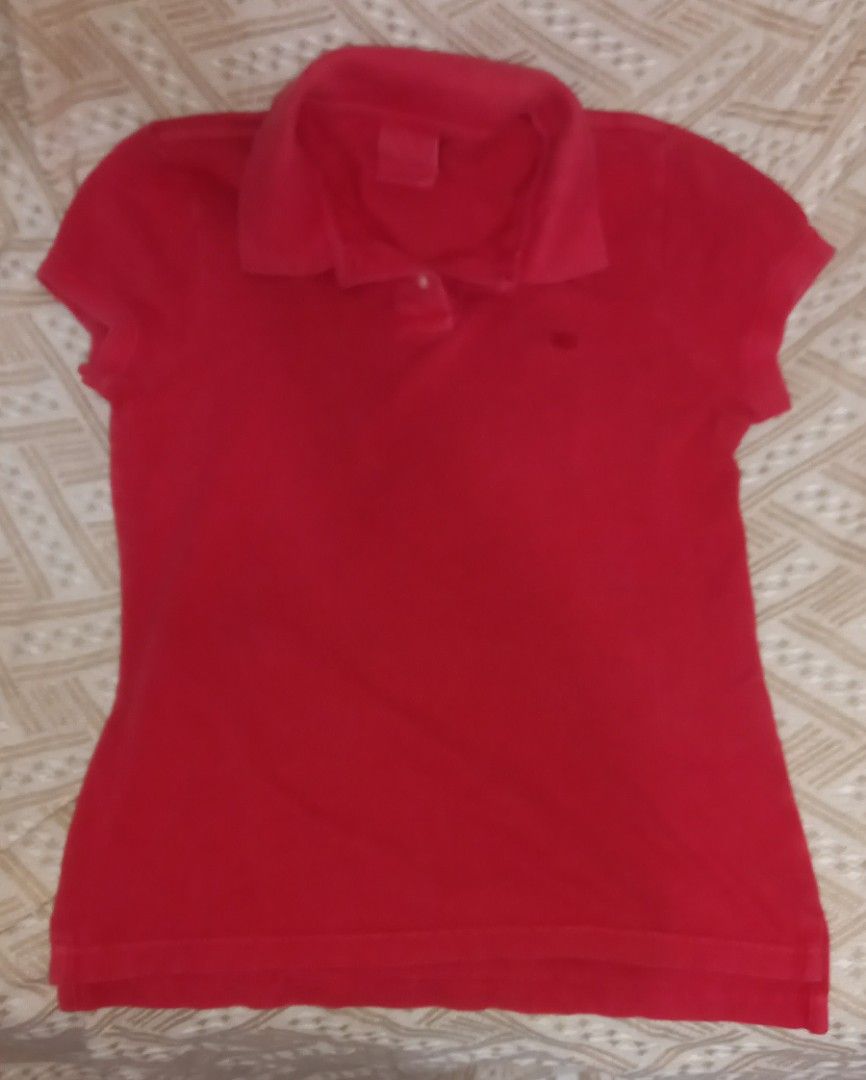 RL Red Polo Shirt Size S (Category: Tshirts & Polo Shirts ) located in Cagayan de Oro. Submitted by edwardryan01984 (Listing ID 1470299180, Image 1). Description: - RL Bright red - Material: 100% cotton (comfortable for daily casual wear and easy to wash) - Size: S (fits 90 cm bust) - Design: Classic collar with front button placket, short sleeves, and small embroidered chest logo.