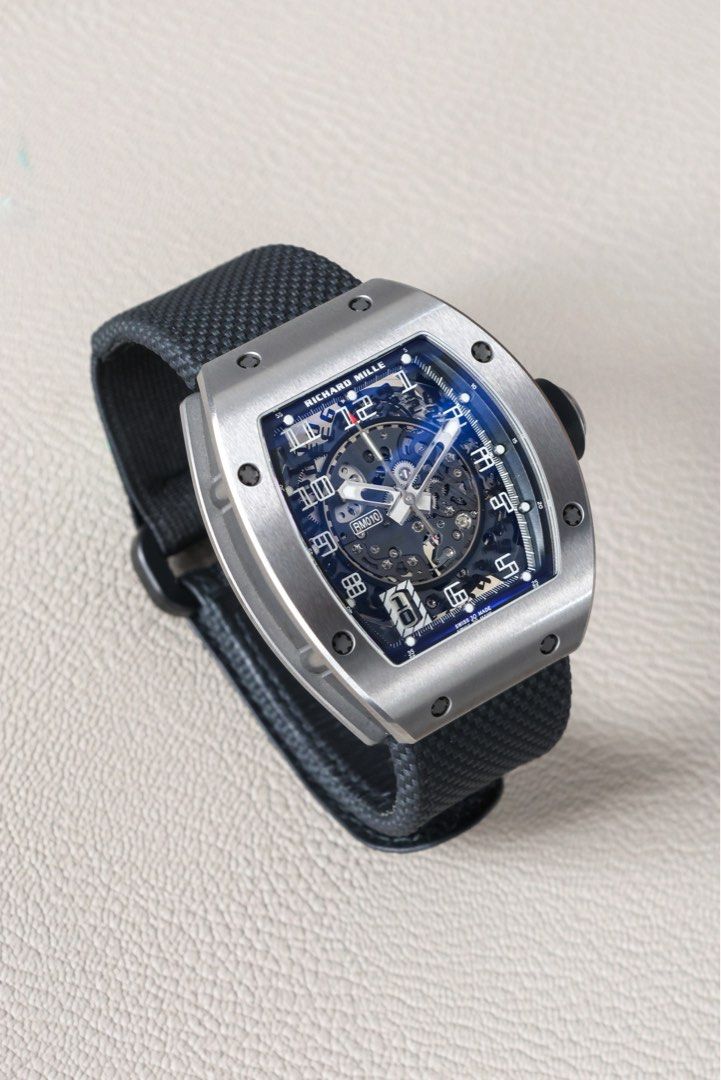 RM 010 Ti (Category: Luxury Watches) located in Makati City. Submitted by vintage.grail (Listing ID 1470178619, Image 3). Description: Richard Mille 010 Titanium Year 2025 Complete set with extra black strap Excellent condition 9.5/10 Priced at Php 10,000,000 DM or Call us to reserve. Available for viewing at Vintage Grail, The Peninsula Manila.