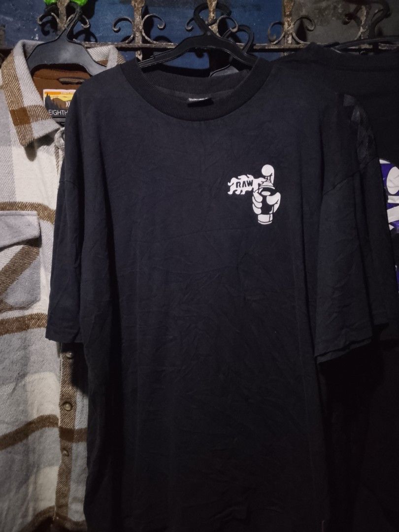 Rock And Write Black Graphic T-Shirt (Category: Tshirts & Polo Shirts ) located in Manila. Submitted by warmcloud-06f3 (Listing ID 1470216901, Image 1). Description: - Brand: Rock And Write (Est. 2018) - Color: Classic Black - Design: Small graffiti hand can print on the chest with a large graffiti text logo across the back - Details: Ribbed crew neck collar and authentic brand neck label inside - Condition: Brand new / Excellent quality - Perfec