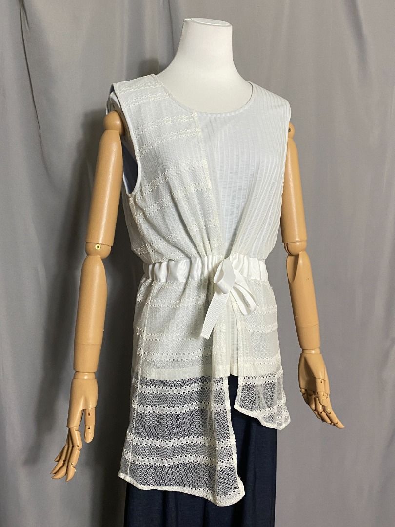 Rococo sleeveless asymmetrical top (Category: Sleeveless) located in Las Pinas. Submitted by ipickyou (Listing ID 1470282476, Image 3). Description: Unwashed Condition: 10/10 𝗠𝗲𝗮𝘀𝘂𝗿𝗲𝗺𝗲𝗻𝘁𝘀 𝘄𝗵𝗲𝗻 𝗹𝗮𝗶𝗱 𝗳𝗹𝗮𝘁: -Size M -Armpit to armpit: 18 1/2” -Length: 32 1/2” .