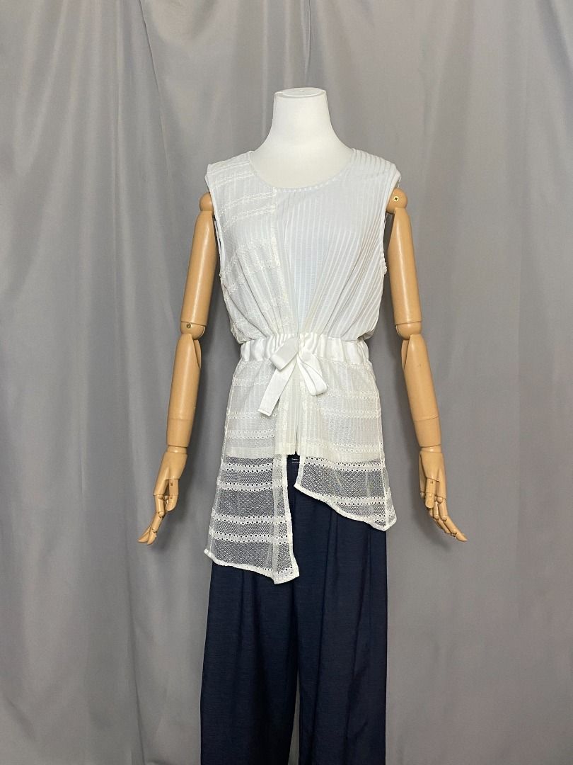 Rococo sleeveless asymmetrical top (Category: Sleeveless) located in Las Pinas. Submitted by ipickyou (Listing ID 1470282476, Image 2). Description: Unwashed Condition: 10/10 𝗠𝗲𝗮𝘀𝘂𝗿𝗲𝗺𝗲𝗻𝘁𝘀 𝘄𝗵𝗲𝗻 𝗹𝗮𝗶𝗱 𝗳𝗹𝗮𝘁: -Size M -Armpit to armpit: 18 1/2” -Length: 32 1/2” .