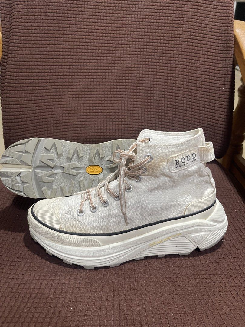 RODD High Top Sneakers White Size US 8 EU 41 (Category: Sneakers) located in Davao. Submitted by rcgulanes.moon (Listing ID 1470156469, Image 2). Description: - Brand/Model: RODD high top canvas sneakers - Color: White with unique patterned laces - Size: EU 41 / US 8 / KR 260-265 - Sole: Chunky platform with durable Vibram yellow dot tread - Condition: Minor signs of wear on uppers and soles, still solid and sturdy overall - Perfect for street st