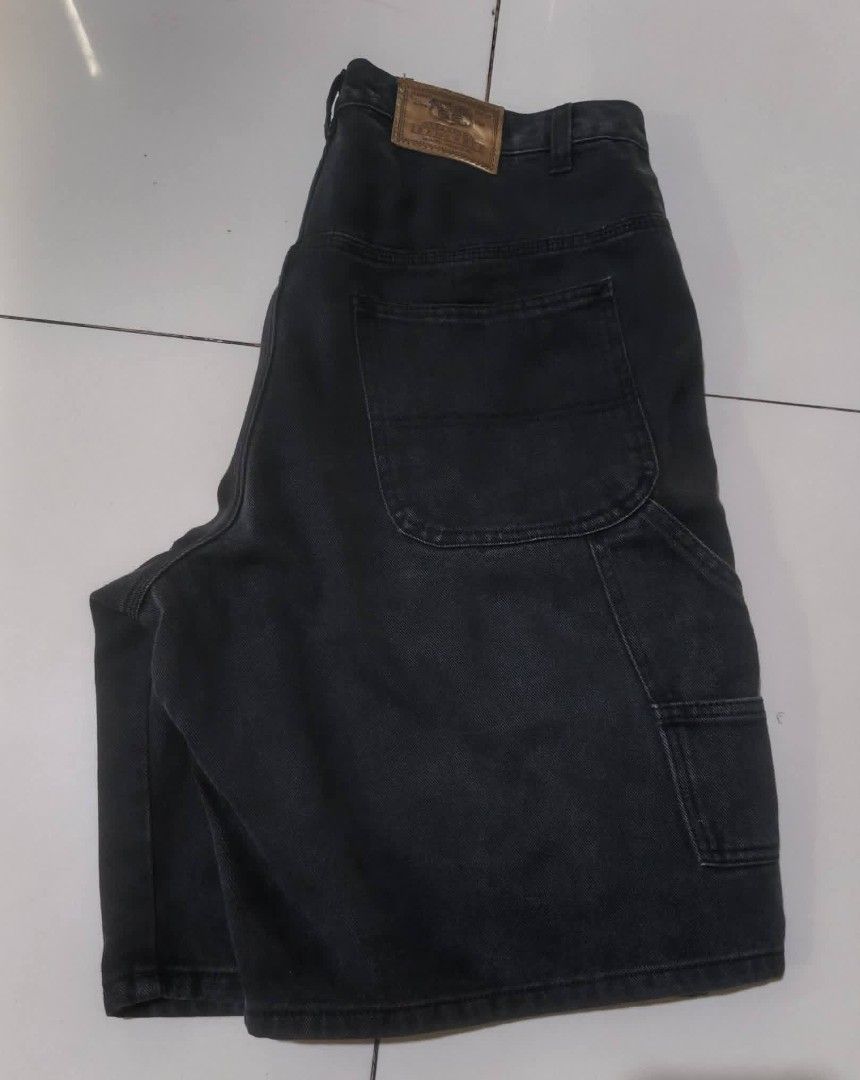 Route 66 Black Denim Cargo Shorts Size 36 (Category: Shorts) located in San Carlos City. Submitted by dhong_abay_thrift (Listing ID 1470206380, Image 1). Description: - Brand: Route 66 - Style: Carpenter denim shorts - Color: Washed black - Size: 36 - Material: 100% heavy-duty cotton - Features: Side pocket details, back patch pockets, branded leather patch, metal button closure.