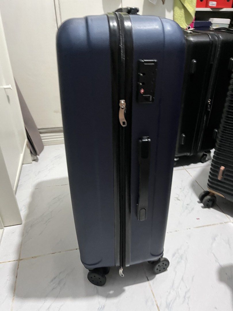 Rudy project luggage (Category: Luggage) located in Marikina City. Submitted by patpatndls (Listing ID 1470271291, Image 3). Description: - Brand: Rudy Project - Size: Medium (approx. 23-24 inches) - Color: Dark blue/black - Material: Durable hardcase exterior - Security: Built-in TSA lock - Interior: Clean grey lining with Rudy Project branding, mesh compartments, and cross straps - Mobility: Smooth-rolling wheels - Condition: Good (4/5) - Meetu