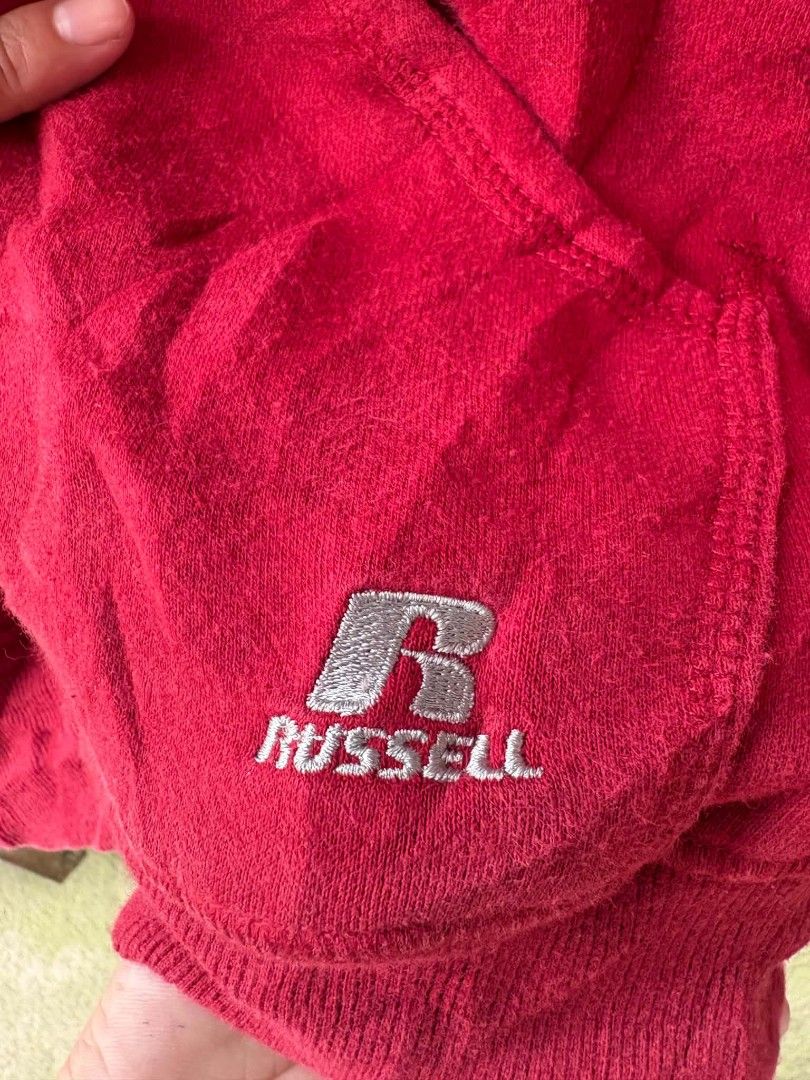Russell Athletic Red Hoodie (Category: Hoodies) located in Caloocan City. Submitted by jerksz (Listing ID 1470220392, Image 3). Description: - Brand: Russell Athletic - Color: Red - Size: Medium (Measures 20" x 24" laying flat) - Material: 80% Cotton, 20% Polyester - Details: Kangaroo pocket with embroidered logo, drawstring hood, ribbed cuffs - Condition: Excellent pre-loved condition - Perfect for daily casual wear!.