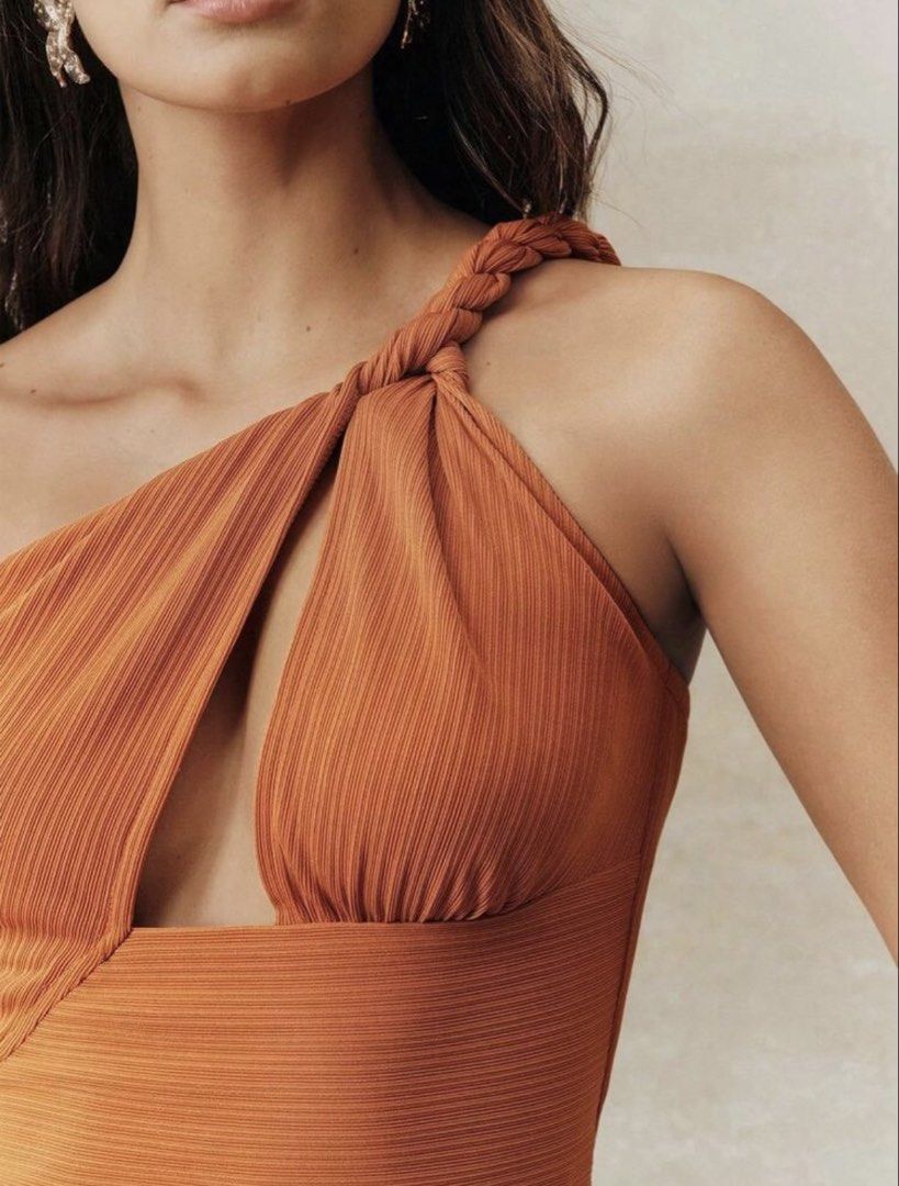 Rust Orange One-Shoulder Braided Crop Top (Category: Sleeveless) located in Manila. Submitted by preloveditems595 (Listing ID 1470227970, Image 2). Description: Never been used.