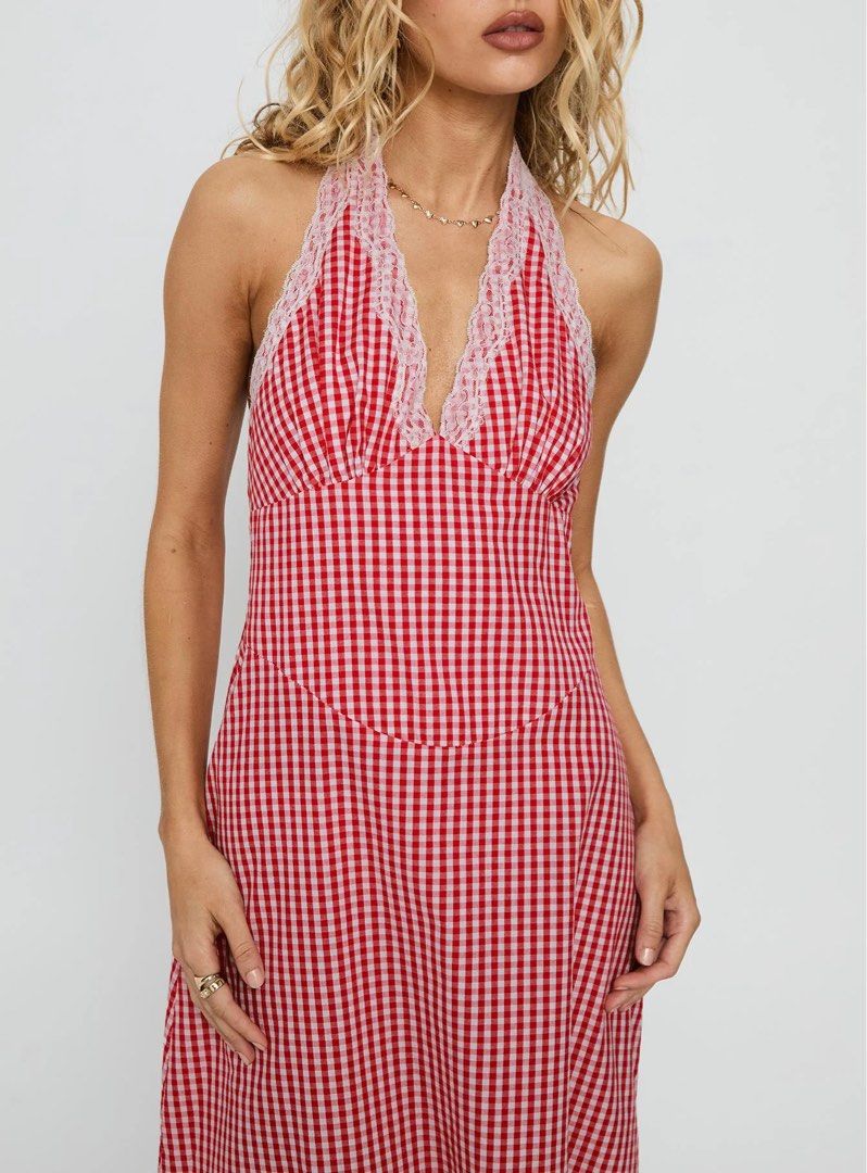 (S) BNWT Pink Diamond Red Gingham Halter Mini Dress (Category: Dresses) located in Morong. Submitted by lysskr (Listing ID 1470295147, Image 2). Description: - Style: Red and white gingham halter dress with open back - Details: White lace trim along V-neck and matching lace border at bottom hem - Condition: Brand new with tags attached, unworn - Size: AUS 8, USA 4, EUR 36 Model photo included is for when worn inspo only RFS: Decluttering .