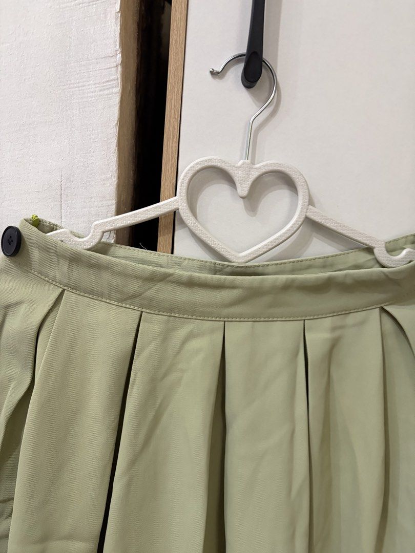 Sage Green Pleated Skirt (Category: Skirts) located in Pateros City. Submitted by downsizin (Listing ID 1470169965, Image 2). Description: Size 26 waist size , 18 in length .