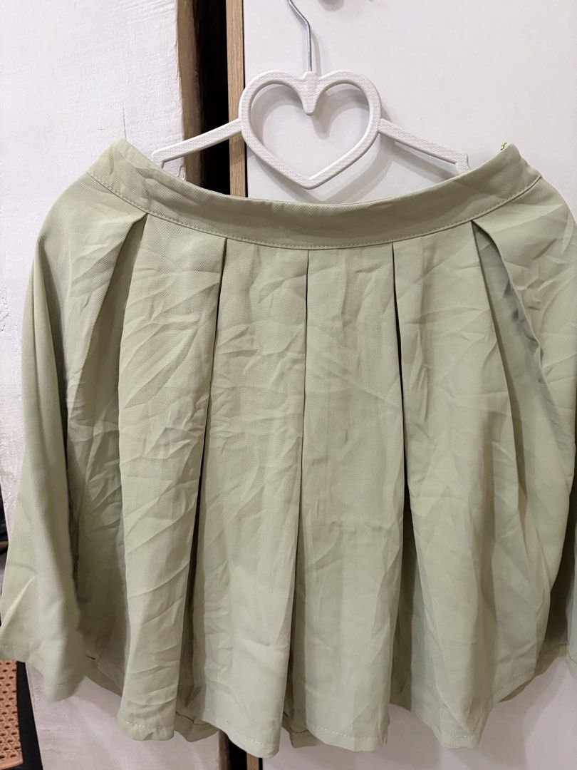Sage Green Pleated Skirt (Category: Skirts) located in Pateros City. Submitted by downsizin (Listing ID 1470169965, Image 3). Description: Size 26 waist size , 18 in length .