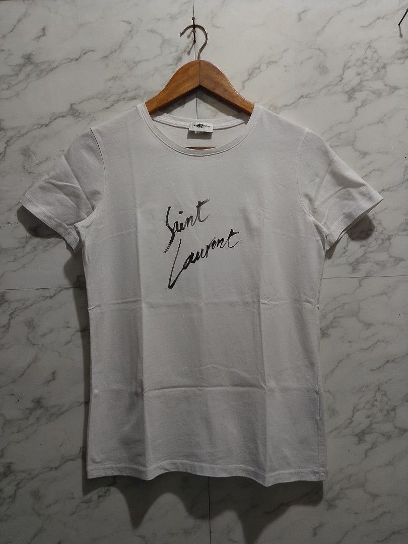 Saint Laurent Spellout T-shirt (Category: Tshirts & Polo Shirts ) located in Paranaque City. Submitted by lanceee.999 (Listing ID 1470325789, Image 1). Description: Size: S Complete Tags Off/Authentic No Issue Excellent Condition.