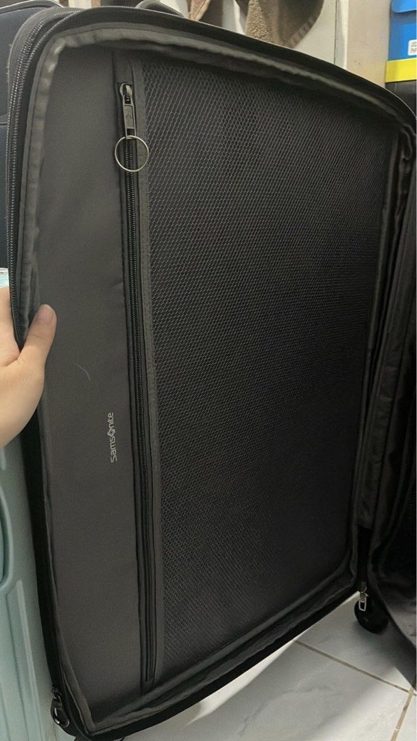 Samsonite luggage (Category: Luggage) located in Marikina City. Submitted by patpatndls (Listing ID 1470268888, Image 3). Description: - Brand: Samsonite - Color: Classic Black - Type: Large Softcase Luggage - Interior: Features mesh storage pockets and adjustable packing straps for organization - Condition: Good, well-maintained - Meetup Location: Marikina High School (F. Torres, Marikina City).