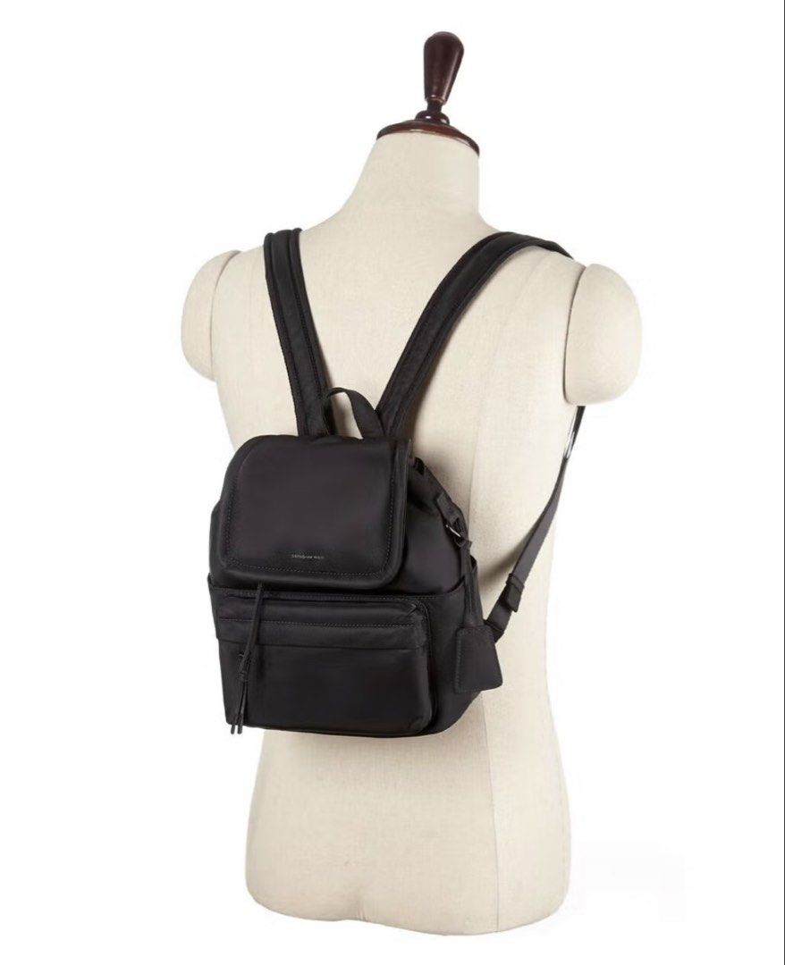 Samsonite Red Glenarm Mini Flap Backpack Black (Category: Backpacks) located in Taguig. Submitted by graceeeee. (Listing ID 1470156785, Image 2). Description: - Bought for 5.9k Php+ in Korea, August 2025 - Brand: Samsonite Red - Style: Mini flap backpack with drawstring closure - Color: Black - Features: Front zip pocket and adjustable shoulder straps - Condition: Used a few times, no issues - Inclusions: Dust bag included - Perfect compact every