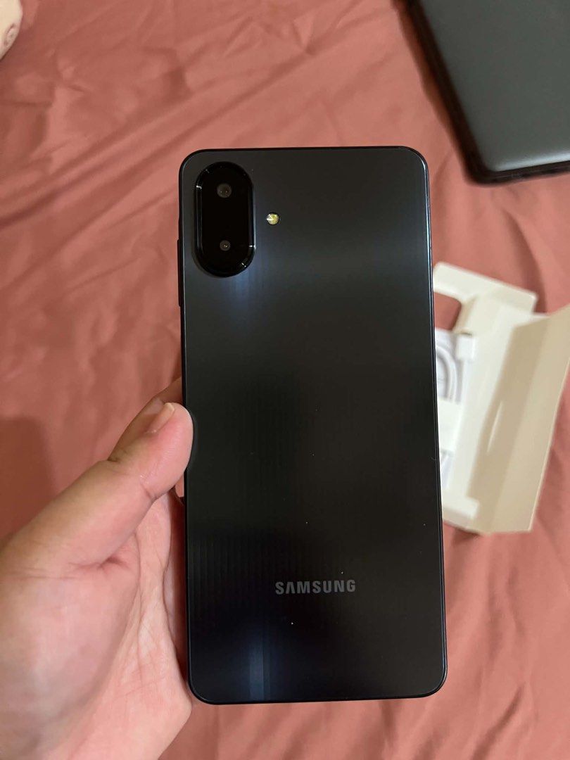 Samsung A07 (Category: Samsung) located in Makati City. Submitted by kunargel1989 (Listing ID 1470348796, Image 3). Description: - Brand: Samsung - Model: Galaxy A07 - Color: Black - Storage: 64GB and below - Condition: Brand new in box with original Type-C cable - Design: Sleek and modern look with a clean, unblemished display and dual rear cameras - Meetup Locations: Glorietta Makati and SM Mall of Asia.