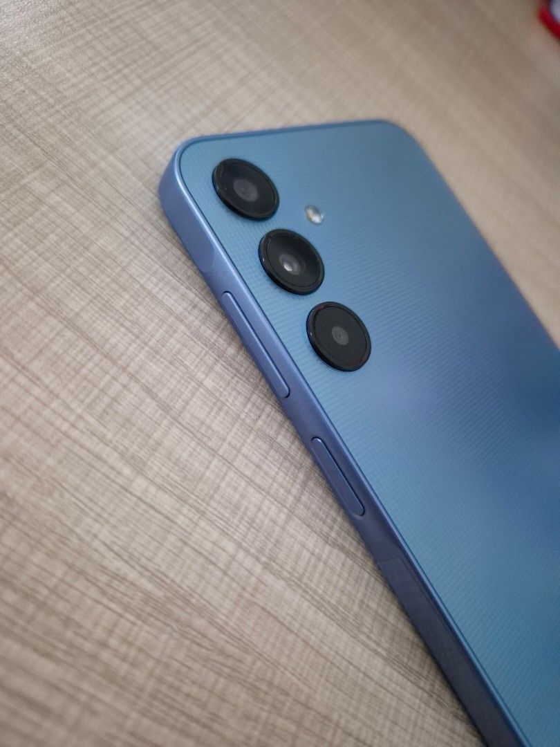 SAMSUNG A25 5G (Category: Samsung) located in Mandaluyong City. Submitted by mjoh_12345 (Listing ID 1470228384, Image 1). Description: For Sale Samsung A25 5G 8GB/256GB Color: Blue with Box and Usb charging new with free case and tempered glass protector SPEC The Samsung Galaxy A25 5G features a 6.5-inch Super AMOLED display, a 50MP triple camera with optical image stabilization, and a 5000mAh battery.Display and DesignScreen: 6.5-inch FHD+ Super