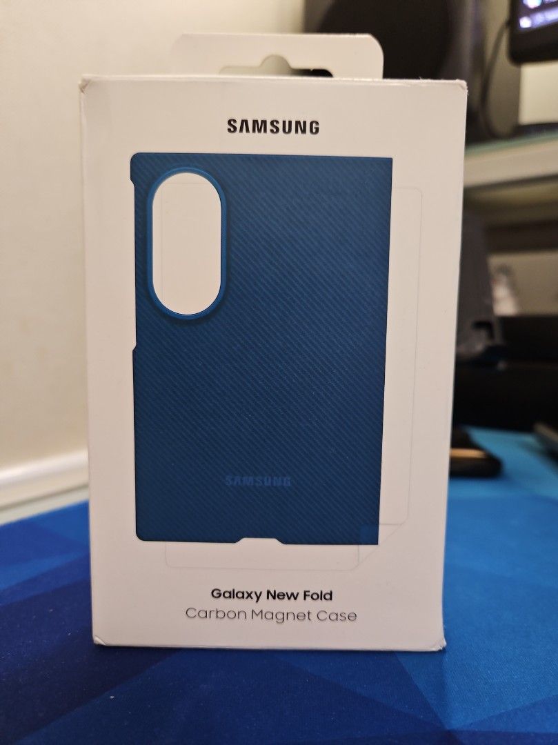 Samsung Carbon Magnet Case (Blue) (Category: Cases & Sleeves) located in Manila. Submitted by chavezychavez (Listing ID 1470262971, Image 1). Description: - Stylish blue carbon fiber pattern with a sleek metallic blue-tone camera frame ring - Ultra-lightweight design at only 25 grams - Precision cutouts ensure easy access to all buttons and ports - Textured surface provides a secure and comfortable grip - Perfect fit for your Samsung phone - Open