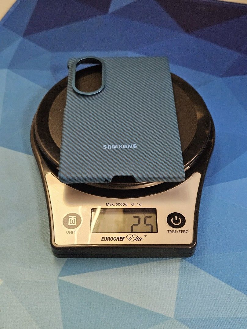 Samsung Carbon Magnet Case (Blue) (Category: Cases & Sleeves) located in Manila. Submitted by chavezychavez (Listing ID 1470262971, Image 2). Description: - Stylish blue carbon fiber pattern with a sleek metallic blue-tone camera frame ring - Ultra-lightweight design at only 25 grams - Precision cutouts ensure easy access to all buttons and ports - Textured surface provides a secure and comfortable grip - Perfect fit for your Samsung phone - Open