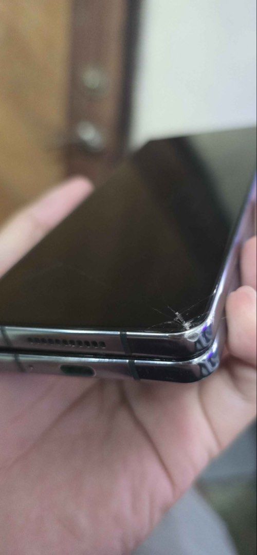 Samsung Galaxy Z Fold 4 (Category: Samsung) located in Bulacan. Submitted by greyyyyylol (Listing ID 1470257495, Image 3). Description: Samsung galaxy Z fold 4 Device only 12gb ram 256gb storage Can use any sim Esim is also available Rfs: naka bili na ng bagong phone Issue: - Main screen is not working - Basag yung out outer screen sa bandang baba pero walang ghost touch - may pink line na sa outer screen - May dents na yung phone Aside from that